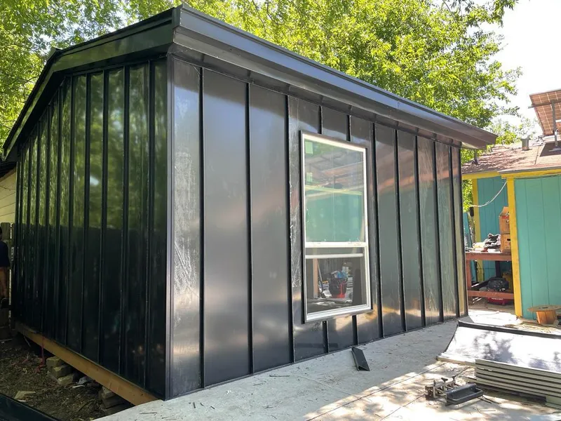 Black standing seam metal wall panels for Metal Roof Installation in Plaistow