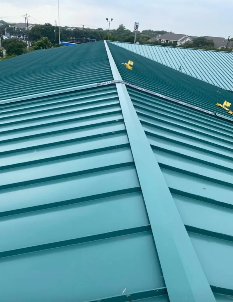 Green commercial metal roof ridge and valley for Metal Roof Repair in Plaistow